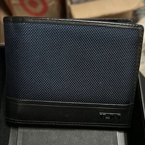TUMI Black and Blue Wallet